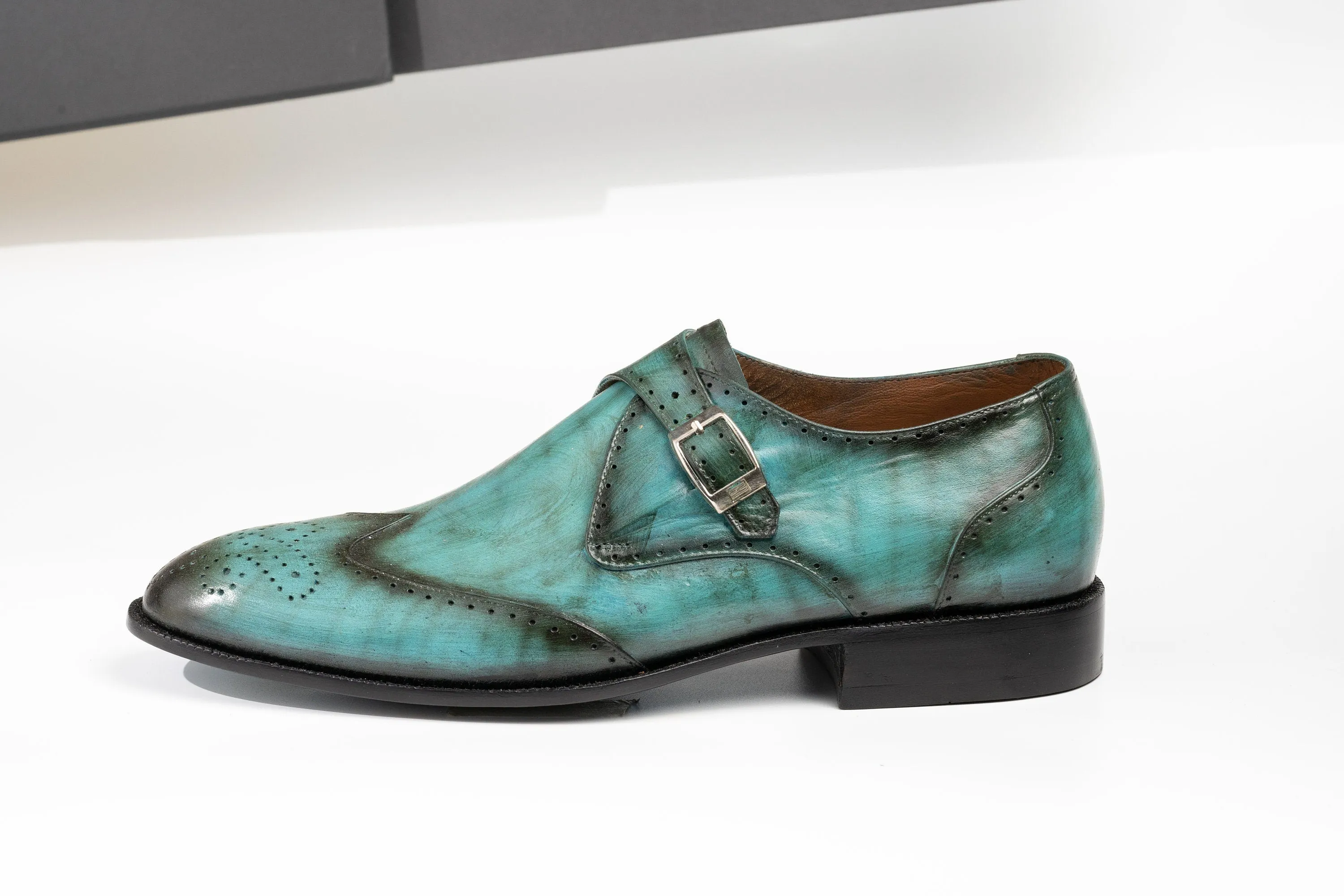 Turquoise Colored Single buckle Wingtip Monk Strap Patina Shoes Made using Crust Leather with Hand Dye Finish